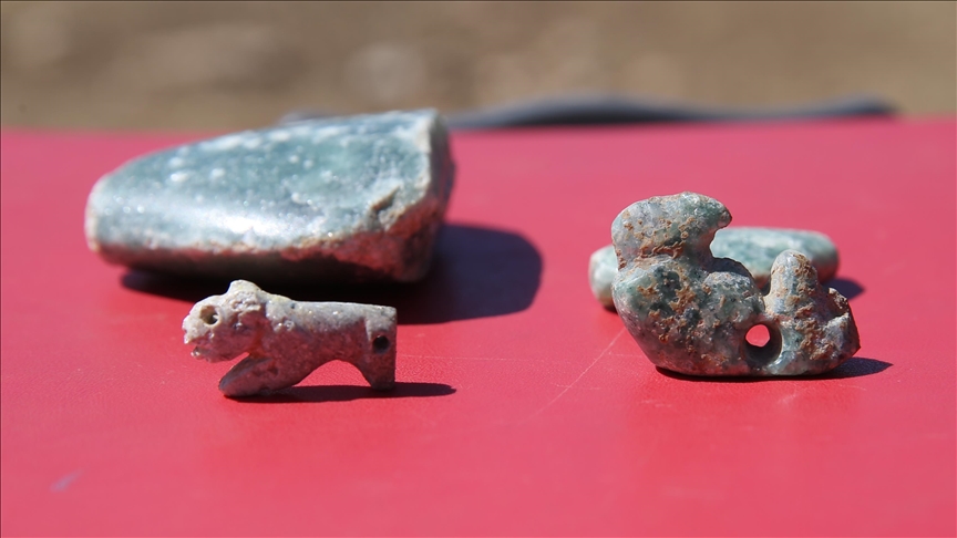 Two 10,000-year-old ornaments with leopard, vulture and human figures found in Sefertepe excavations