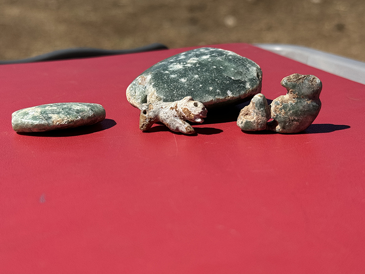 Two 10,000-year-old ornaments with leopard, vulture and human figures found in Sefertepe excavations