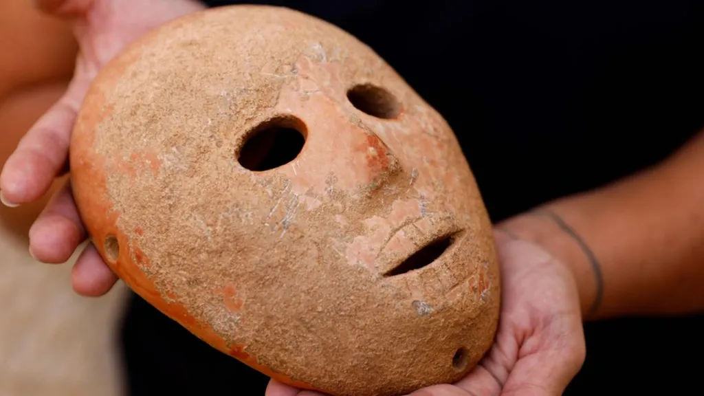A rare stone mask discovered on Mount Hebron, more than 9,500 years old, will go on public display