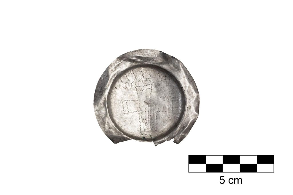 Hungarian archaeologists unearth a 600-year-old silver communion set