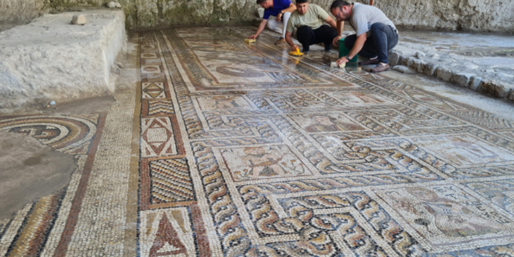 Roman mosaics found in the foundation excavation are being unearthed