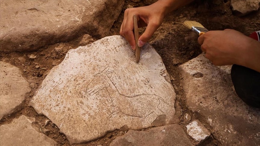 Running wild donkey figure carved on stone discovered at Karahantepe