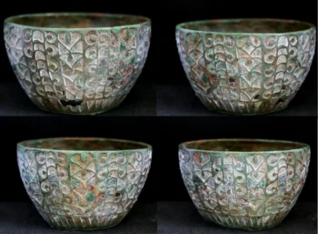 In a 6th-century Anglo-Saxon tomb, an ancient Roman chalice was discovered containing pig fat